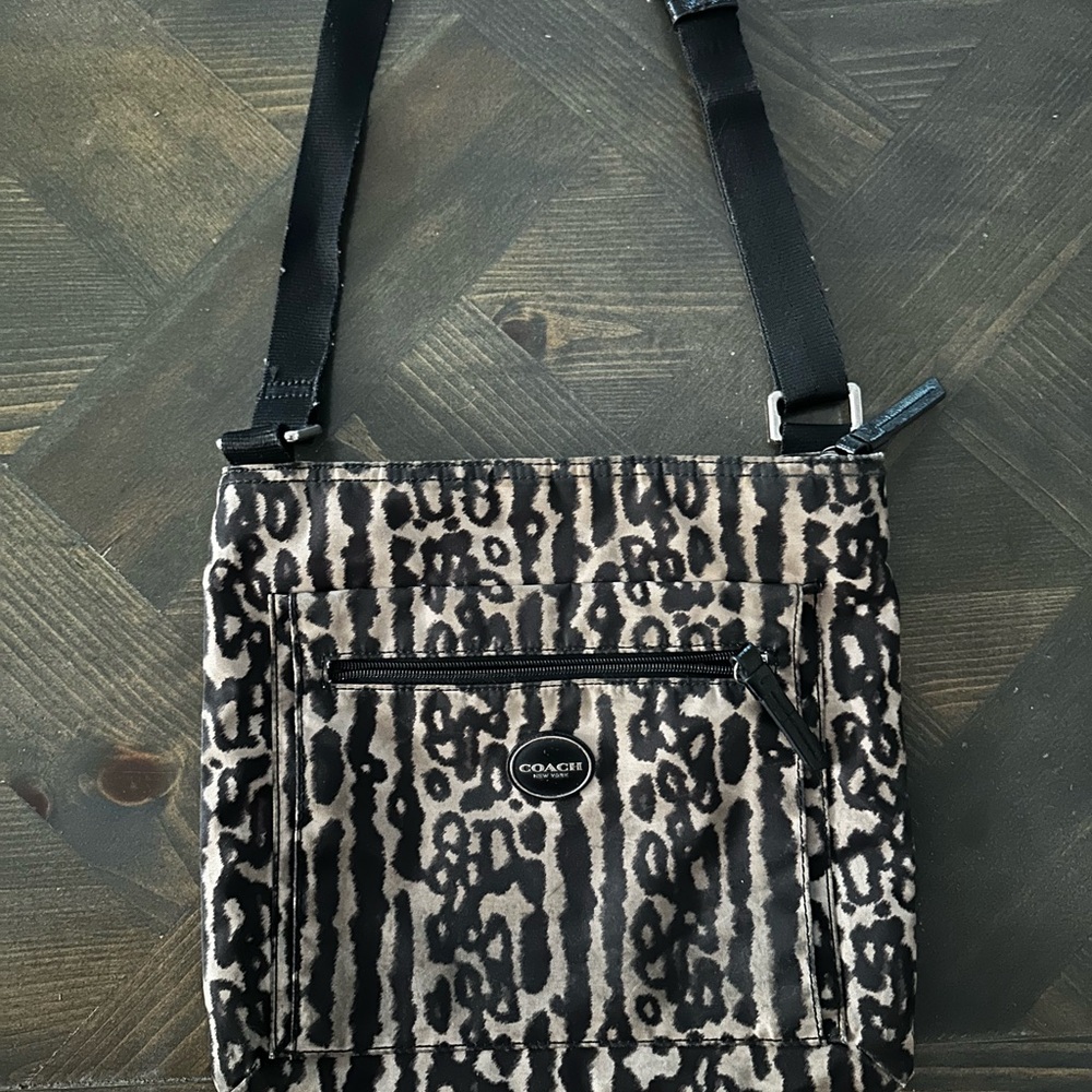 Coach Black and Tan Crossbody Bag with Structured Design